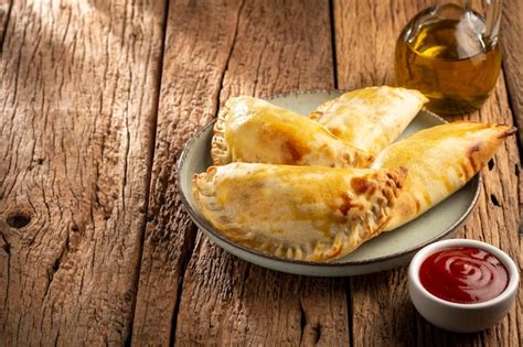 Premium Photo | Tasty spicy meat empanadas Argentine empanadas