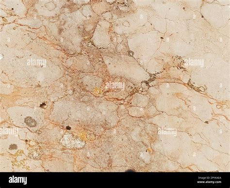 Marble background, white rock. Marble with cracks. Beige, yellow and brown natural colors ...