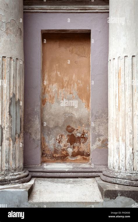 Detail of an old cement wall texture with pillars Stock Photo - Alamy