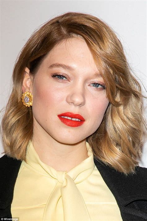 Lea Seydoux flaunts her impeccable pins in a chic black mini skirt ...
