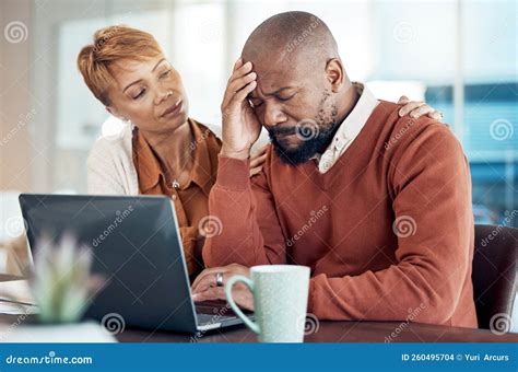 sad couple laptop  finance stress  tax house mortgage loan