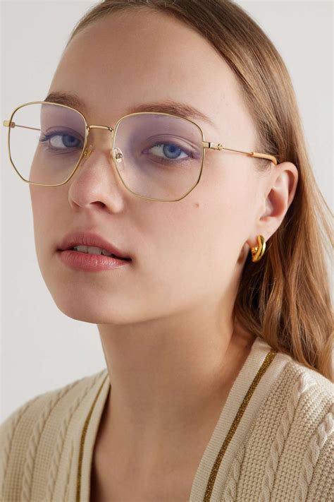 GUCCI EYEWEAR Hexagon-frame gold-tone optical glasses | Optical glasses