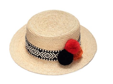 Straw hat with pompoms