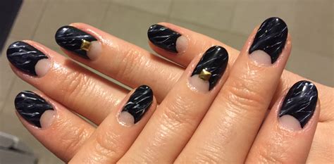 Finished my Black Marble nails with gold studs while I watch the ...