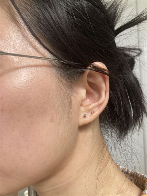 Are my two earlobe piercings too far apart? : r/Legitpiercing
