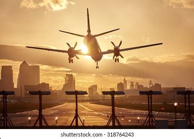 Airplane Landing Sunset Stock Photo 318764243 | Shutterstock