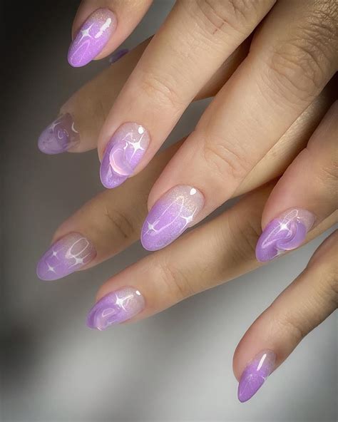 blue and purple ombre nails with glitter 8