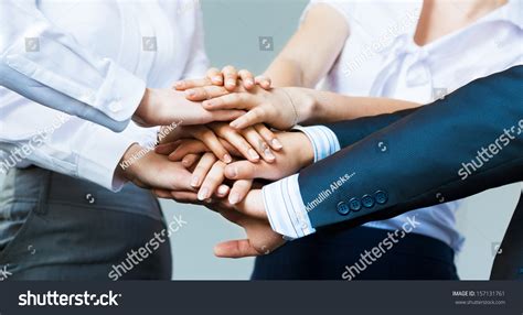 concept teamwork business people joined hands stock photo edit