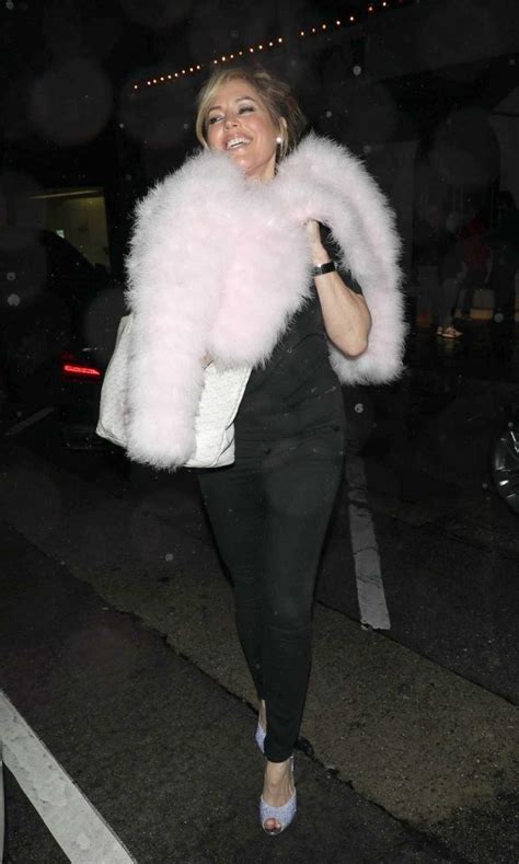 Sandra Taylor in a Black Pants Strikes a Few Fun Poses for the Cameras