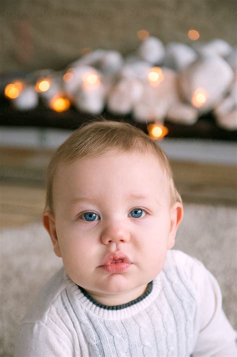 "Baby Boy Sitting On Floor At Home" by Stocksy Contributor "Danil