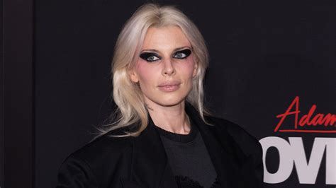 Julia Fox goes naked, wearing nothing but a hip-skimming hair bra