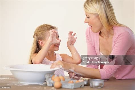 Making A Marvelous Mess With Mum High-Res Stock Photo - Getty Images