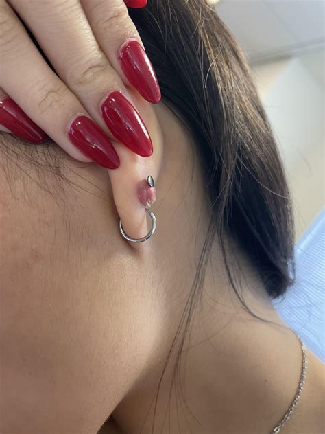 Got a septum piercing but it looks kinda unveven. I just got the