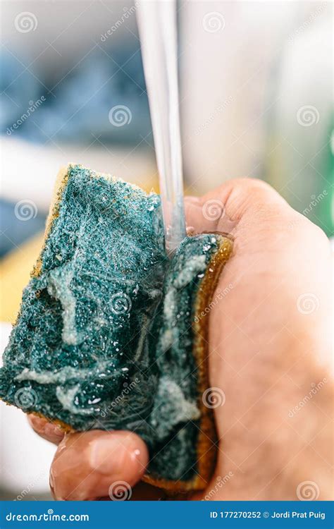 Pouring Water on To a Washing Rub Hold by Hand Stock Photo - Image of ...