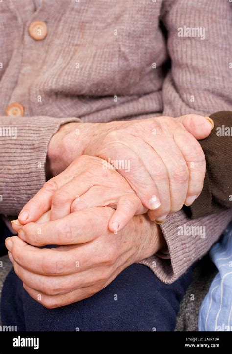 couple holding  hands stock photo alamy