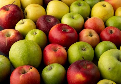 Side view apple mix green yellow and red apples background | Free Photo