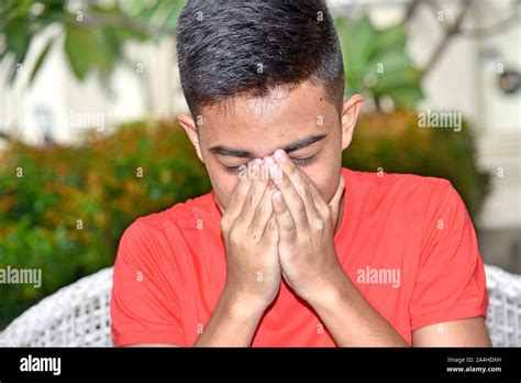 Shameful Young Person Stock Photo - Alamy