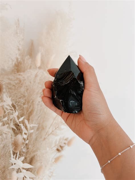 Obsidian Raw Polished Point – SOLEIL CRYSTALS