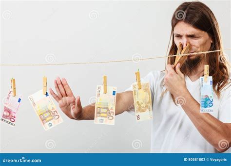 Young man sick of money stock photo. Image of banknotes - 80581802
