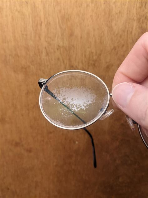 Anti-glare coating on glasses lenses wearing away unevenly - how to