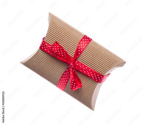 Brown gift box with red ribbon isolated on white Stock Photo | Adobe Stock