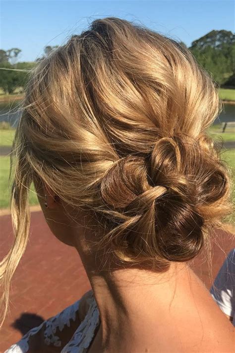 Chic Updos To Elevate Your Hair Game : Textured Loop Low Bun