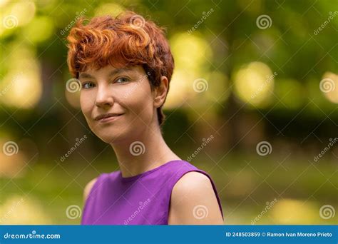 binary gender person   camera  relaxed expression