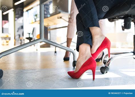 Legs of Unregognizable Business Women in High Heels. Stock Image ...