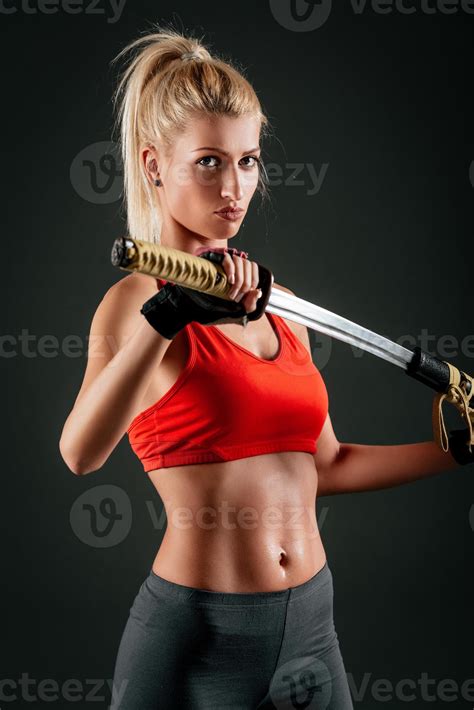 Woman With Katana 14065600 Stock Photo at Vecteezy