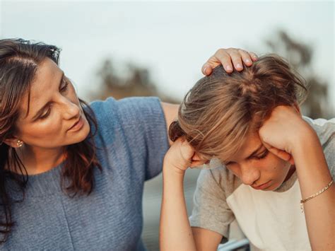 mom comforting anxious boy - Coping Space