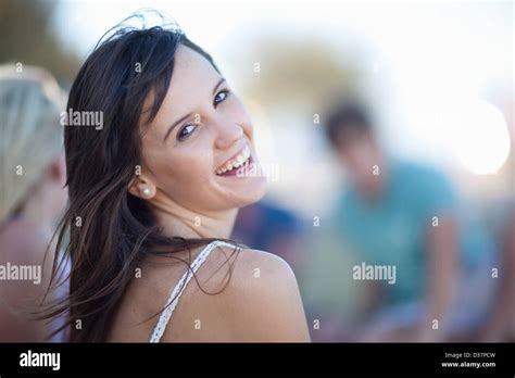 Woman laughing outdoors Stock Photo - Alamy