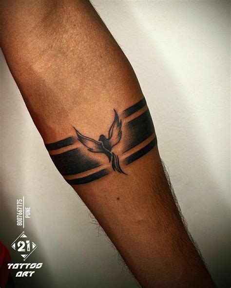 Arm band tattoo | Hand tattoos for guys, Wrist tattoos for guys, Band ...