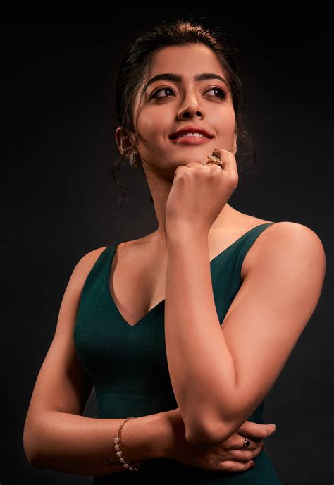 Download Rashmika Mandanna HD Dark Green Dress Wallpaper | Wallpapers.com