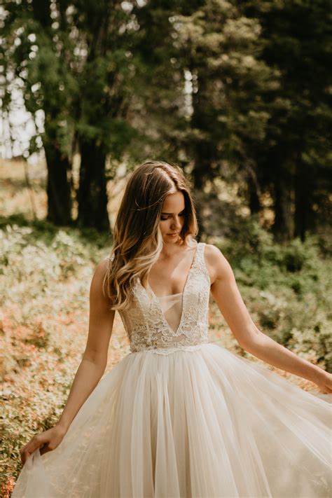 Luna wedding dress for the hippie bride. Bell sleeves and flowy silk
