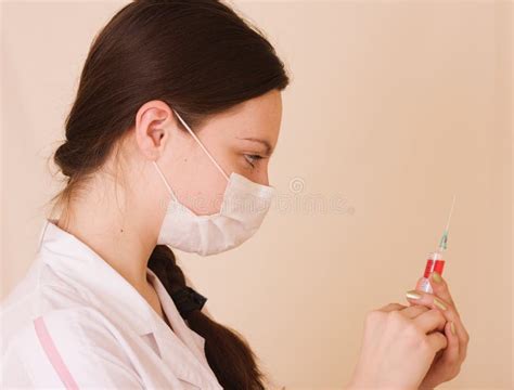 Nurse with syringe stock image. Image of single, needle - 14294673