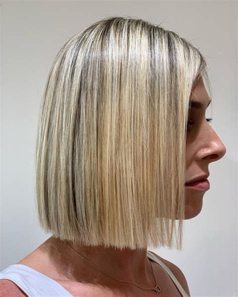 Stylists are arguing over the blunt bob haircut with fringe 25