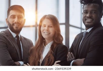 group  employees posing   stock photo
