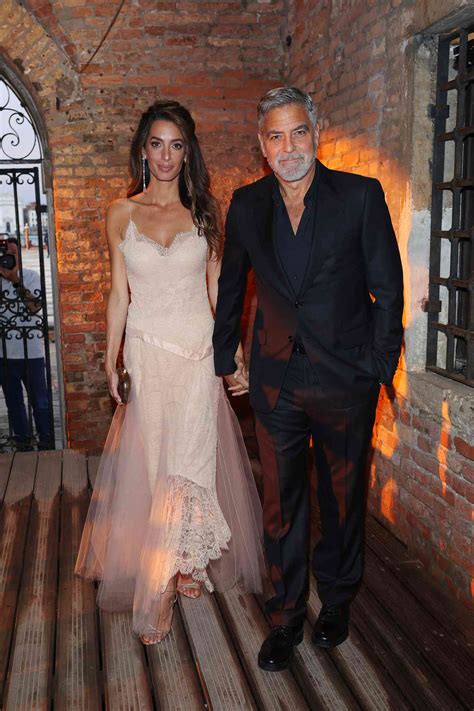 Amal Clooney Looked Like a Literal Disco Ball in a Mirror-Covered Minidress and Holographic Heels