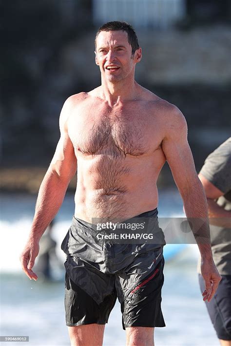 Hugh Jackman swimming at Bondi Beach on August 16, 2016 in Sydney