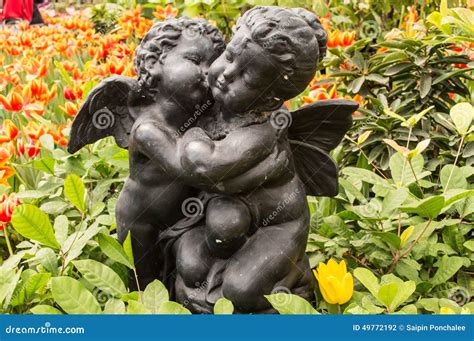 Cupid statue stock photo. Image of wing, cemetery, white - 49772192