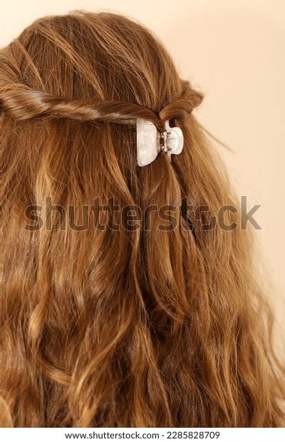 dark blonde hair twisted  clasped stock photo  shutterstock