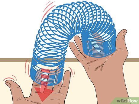 How to Do Cool Tricks With a Slinky (with Pictures) - wikiHow