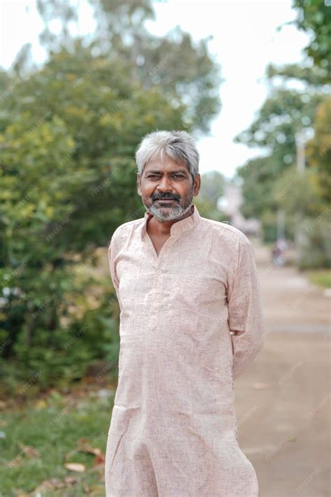 Premium Photo | Indian old man giving expression on nature background