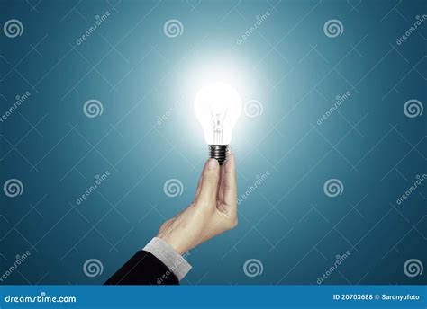 Businessman Hand Holding A Lamp. Stock Photo - Image of electric ...