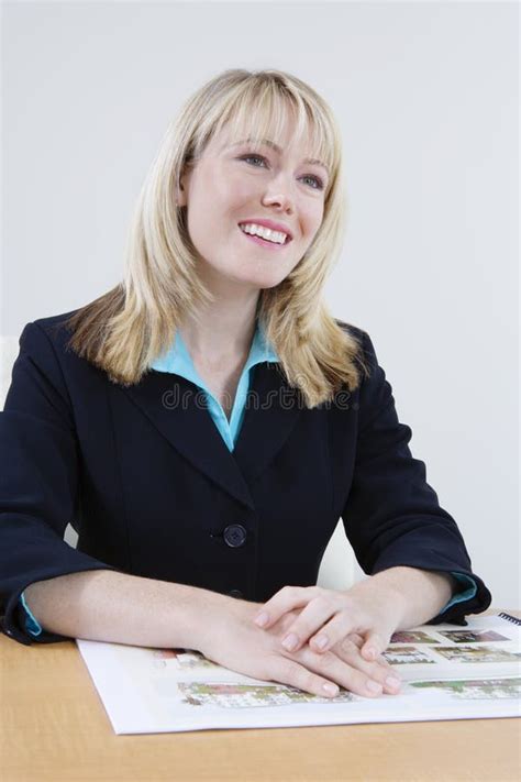 Happy Female Estate Agent Looking Building Models Stock Photos - Free ...