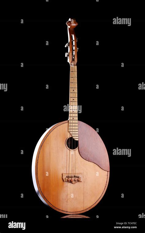 Retro kobza- Ukrainian musical instrument on black background Stock ...