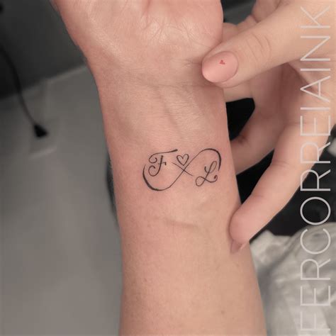 Tatuagem Infinito Com Nome E Coração - Tatuagem infinito com as iniciais do pai e da mãe | Tatuagem com ...