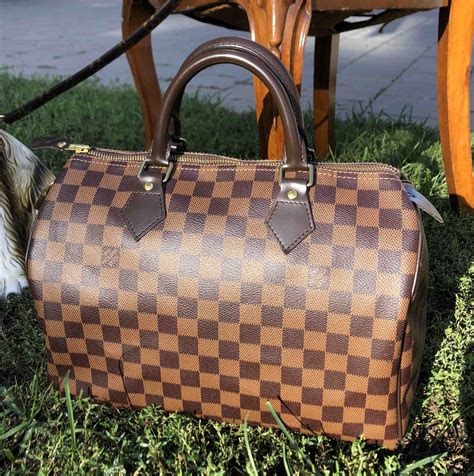 LOUIS VUITTON KÄSILAUKKU | Antiikkiliike Wanha Elias