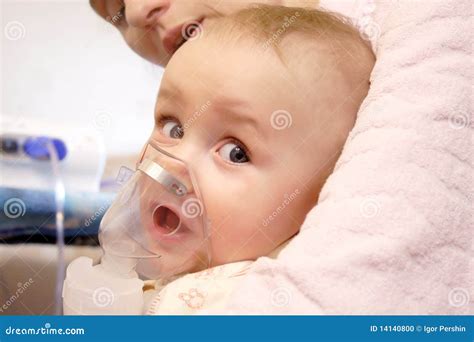 Baby With Nebulizer Mask Stock Photo | CartoonDealer.com #14140800