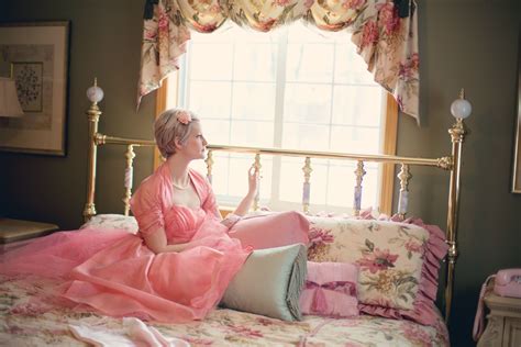 Woman Sitting on Bed Near Window · Free Stock Photo